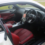 Stylish red adds some oomph in the Q60's interior design