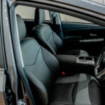 Driver and passenger seats in a Toyota Prius Plus Hybrid